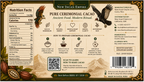 Back of a package for New Incan Empire Pure Ceremonial Cacao, showing nutrition facts, preparation steps, ingredients, barcode, and decorative eagle artwork on a beige background with brown borders.